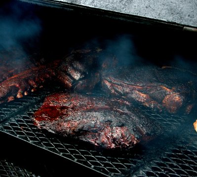 cooking a beautiful brisket on the grill