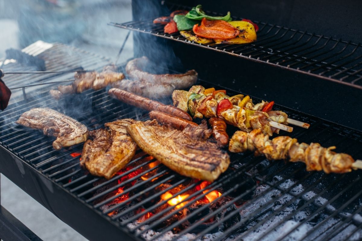 Pellet Grill vs Charcoal Grill - Which Is Better? - Own The Grill